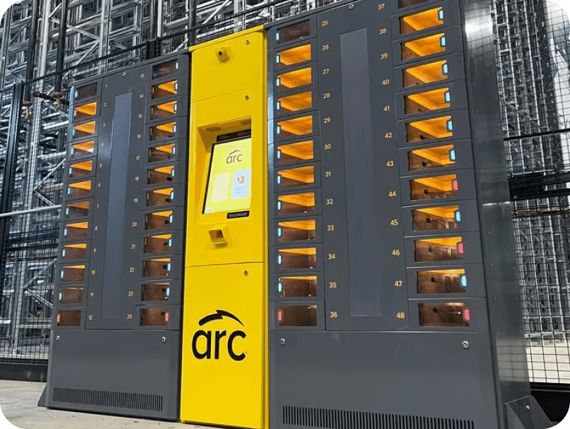 A tall, dual-sided intelligent locker unit labeled with "arc" in black text on a bright yellow central panel. The central panel features a touchscreen control interface. On both sides of the central panel, there are 48 compartments with translucent doors and indicator lights.